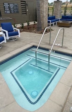 a small swimming pool with a stainless steel hand railat Westbury Apartments, Rancho Cucamonga, CA, 91739